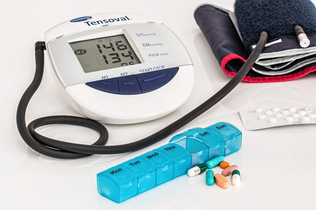 Blood pressure monitor, pill organizer, and medications for hypertension management and treatment